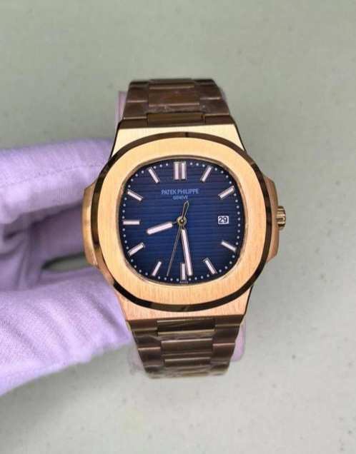 ساعت مچی پتک فیلیپ قاب وبندطلایی صفحه سورمه ای