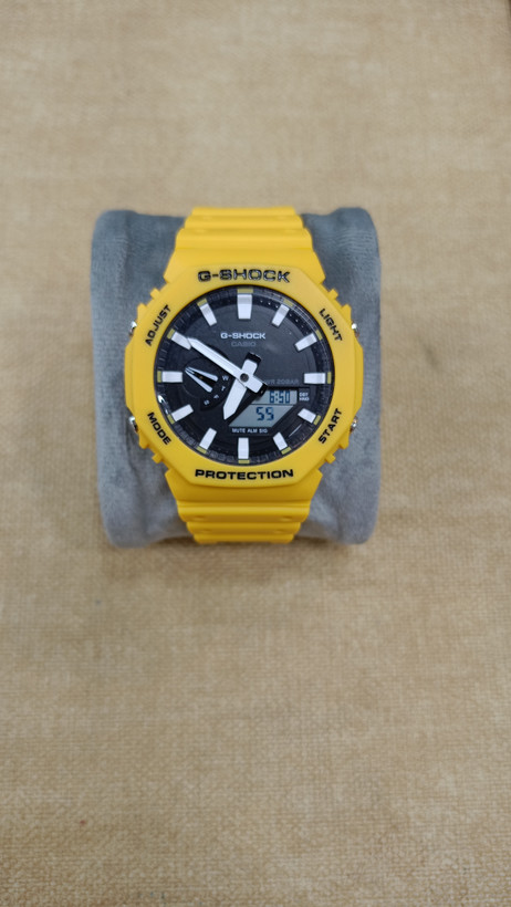 ساعت مردانه جی شاک رنگ زرد صفحه مشکی